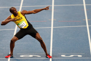  Usain Bolt moves to trademark signature victory pose