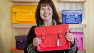  Cambridge Satchel Company founder Julie Deane packs her bags after sale to Chargeurs