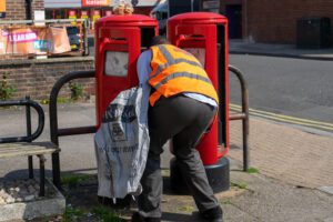  Royal Mail blames strike action for slumping to year loss of more than £1bn